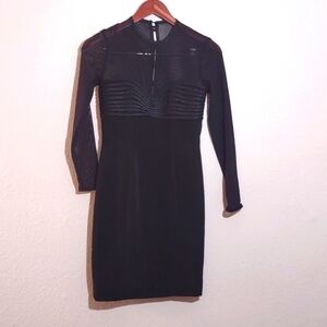 SLIGHTLY USED BLACK DRESS MESH FRONT